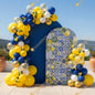 A vibrant Amalfi-inspired setup with blue-and-yellow balloons and lemon-patterned backdrops - a bright, Mediterranean-style celebration.
