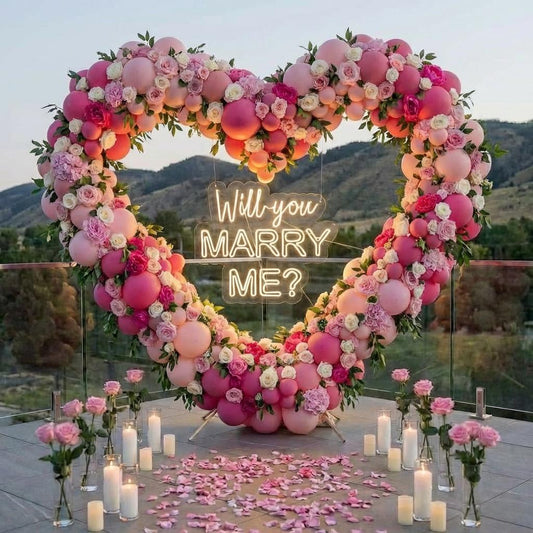 Pink heart-shaped balloon centerpiece for a Valentine's Day or bridal shower setup