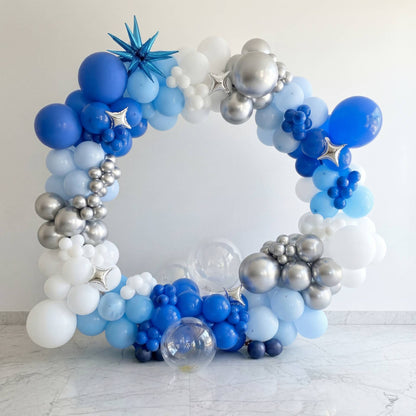 A modern statement piece that brings clean luxury and soft celestial vibes to any event.
Rich blues, crisp whites, and metallic silver accents create a stunning 360° display - perfect for birthdays, baby showers, corporate events, and photo moments.