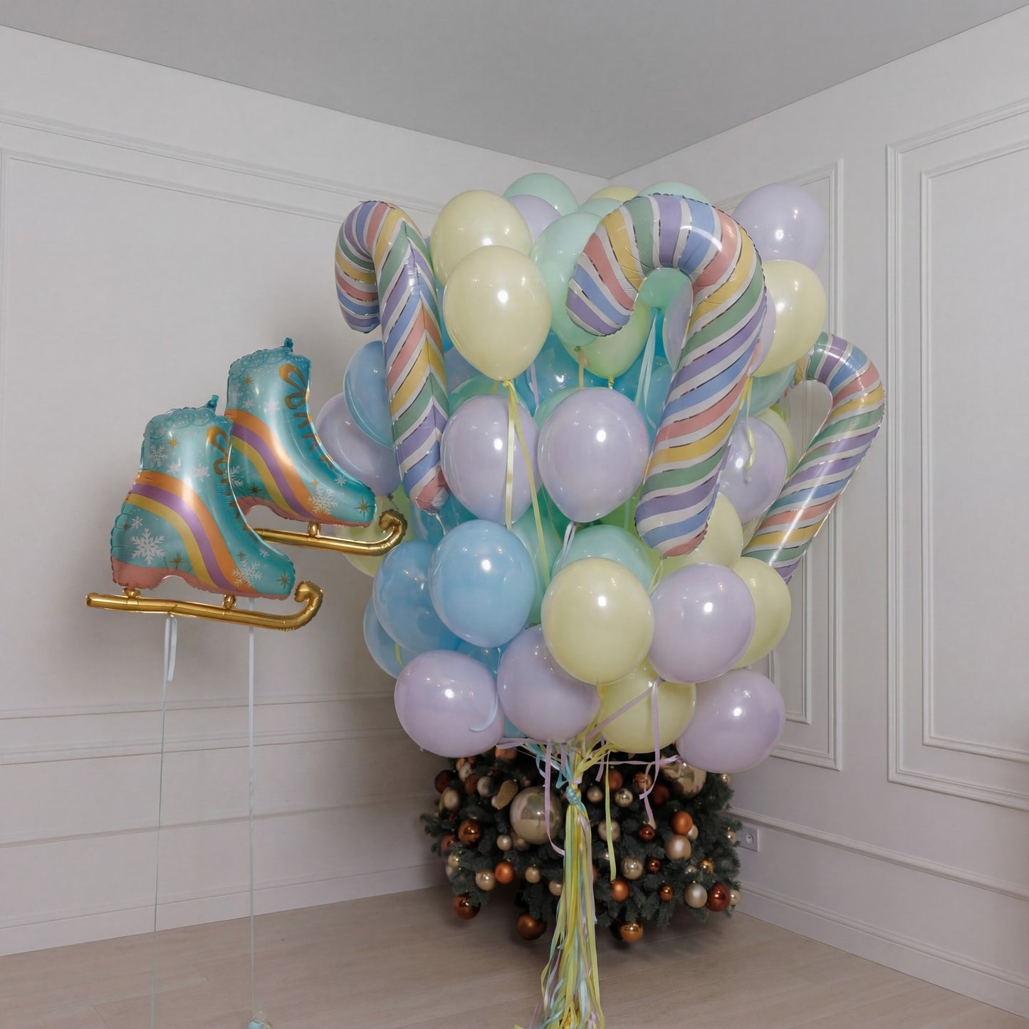 A sweet winter setup featuring pastel balloons, striped candy canes, shimmering clear spheres, and adorable oversized ice skates. Soft, playful, and full of holiday charm - perfect for kids’ celebrations, cozy Christmas photos, and magical winter moments.