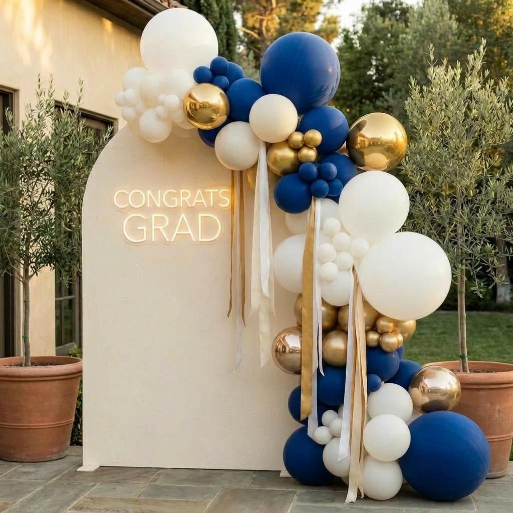 UCLA graduation backdrop in blue and gold — balloon wall for a UCLA grad party