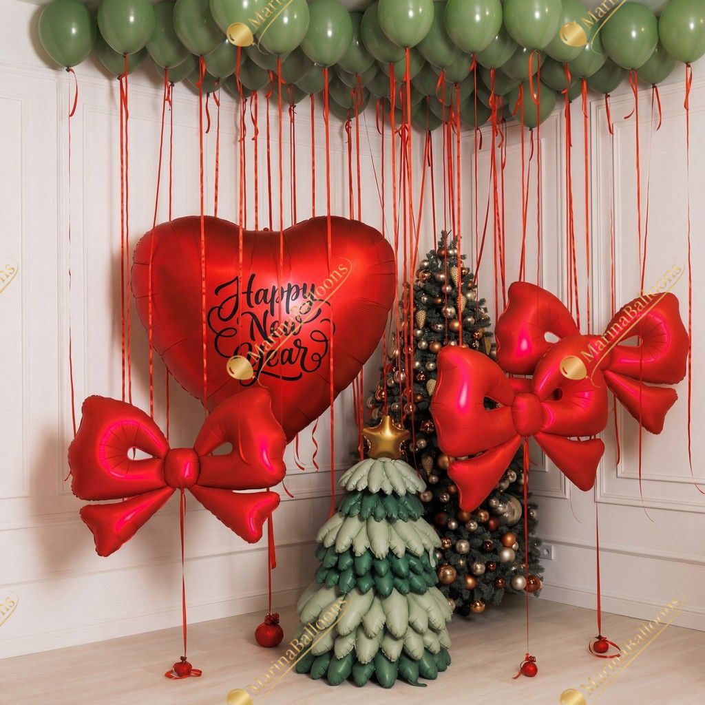 A festive New Year setup featuring floating green ceiling balloons, red satin bows, and a charming balloon Christmas tree. Warm, bright, and instantly joyful - the perfect backdrop for holiday photos and cozy celebrations.