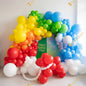 A bright and joyful rainbow balloon arch - a vibrant, colorful setup for a fun and energetic kids’ birthday celebration.