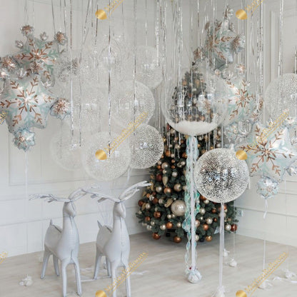 A graceful winter setup featuring shimmering snowflake balloons, crystal-clear spheres, silver ribbons, and soft white reindeer accents. Light, airy, and elegantly frosted - this design brings pure holiday magic and creates a stunning backdrop for Christmas photos and winter celebrations.