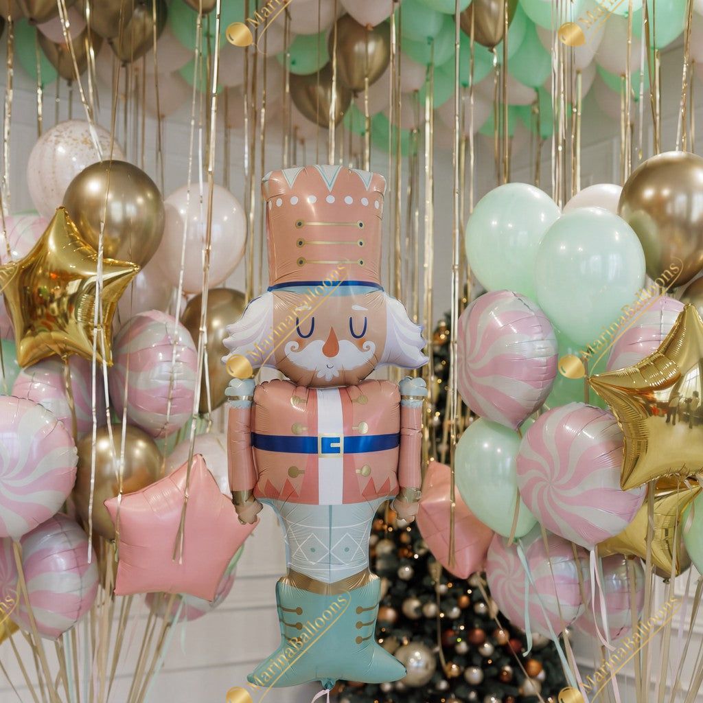 A soft pastel Christmas setup featuring floating ceiling balloons, golden ribbons, and adorable Nutcracker characters. Delicate, magical, and full of holiday charm - the perfect backdrop for kids’ celebrations, family photos, and festive winter events.
